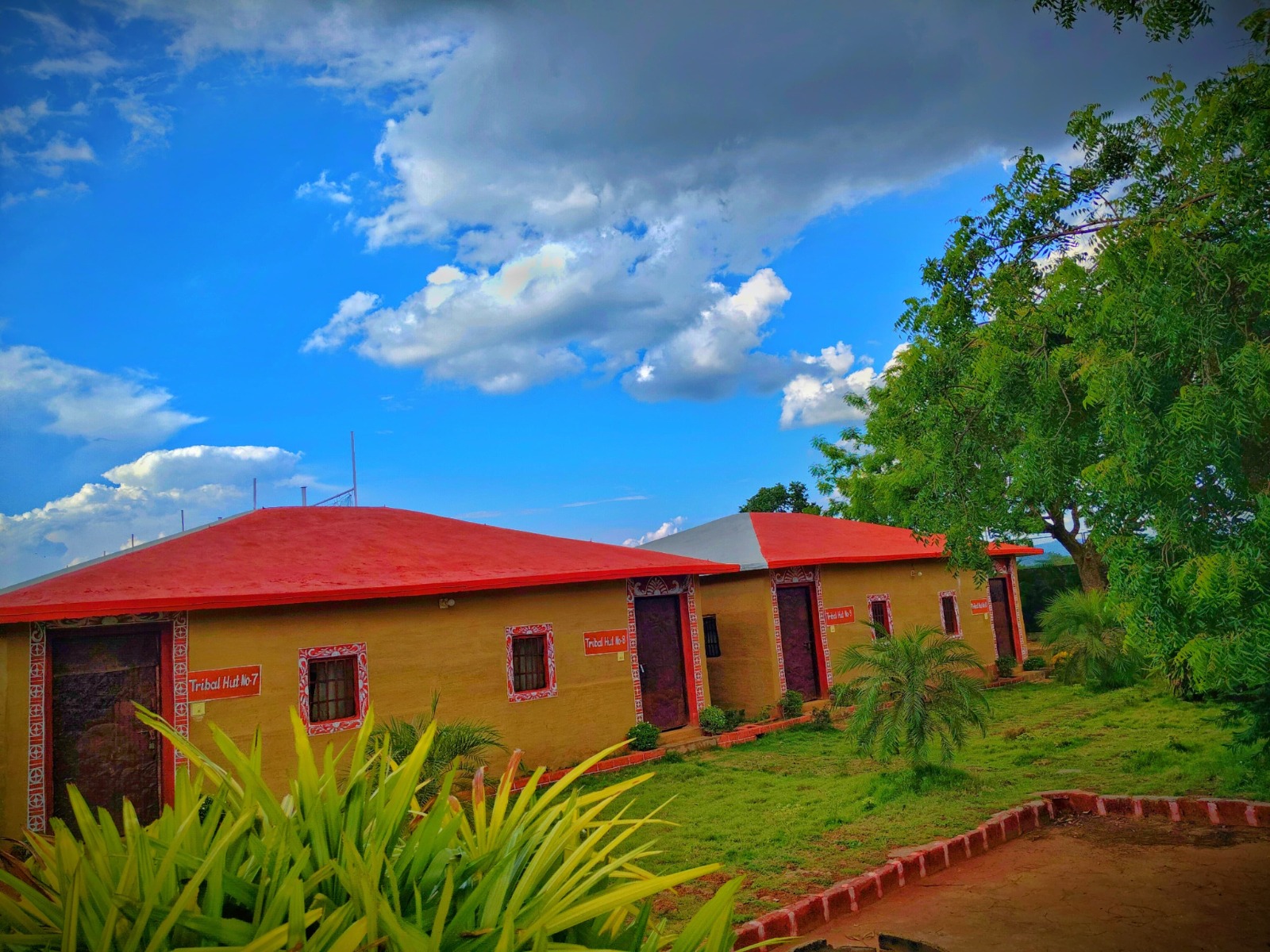 Mud-themed Tribal Hut at Waldenwoods Eco Retreat near Cuttack with hand-painted tribal artwork
